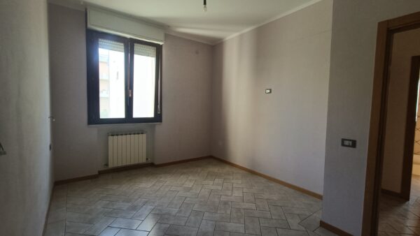 Appartamento piano terra con ampio giardino e garage  -Rif. A143 - immagine 11